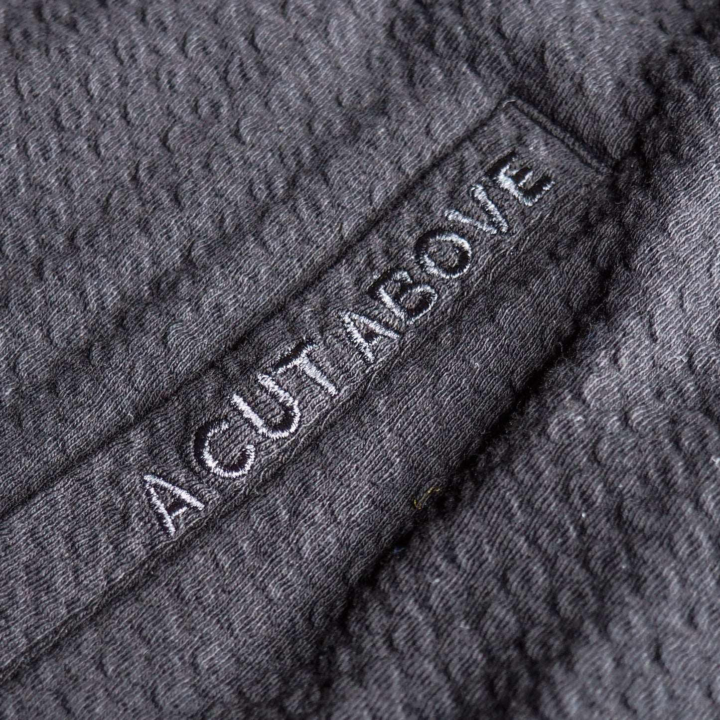 BLACK WAFFLE KNIT HOODIE