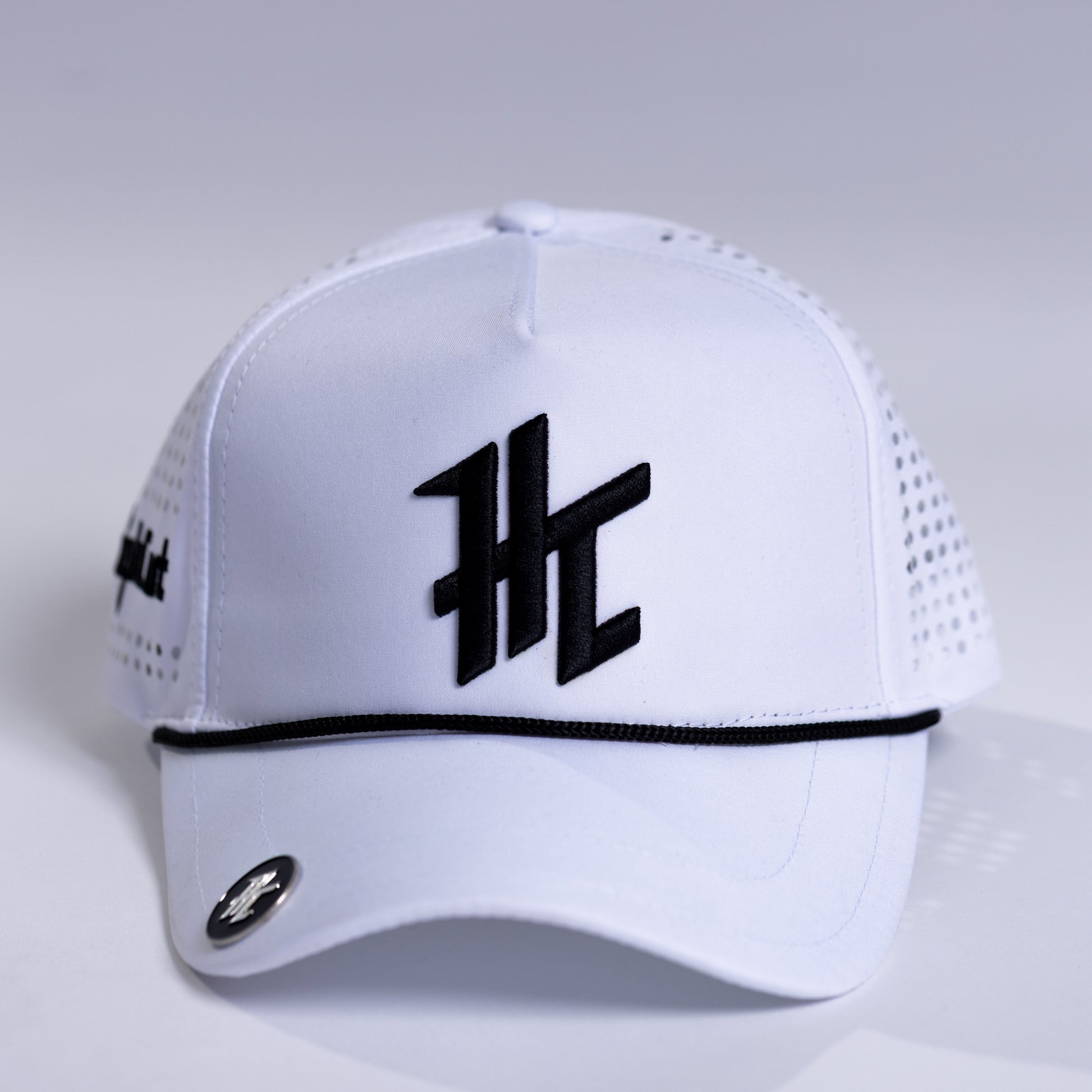 White Cap with a Black HC Logo by HighCut Golf New Zealand.